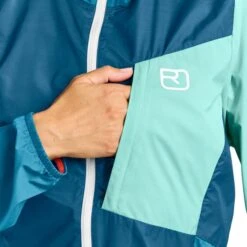 ORTOVOX WINDBREAKER JACKET W PETROL BLUE 23 12 ORTOVOX WINDBREAKER JACKET W PETROL BLUE 23 -Winter Sportswear 9 124515 60010 55901 05